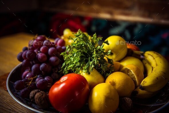 Juicy fruits and vegetables on a wooden table